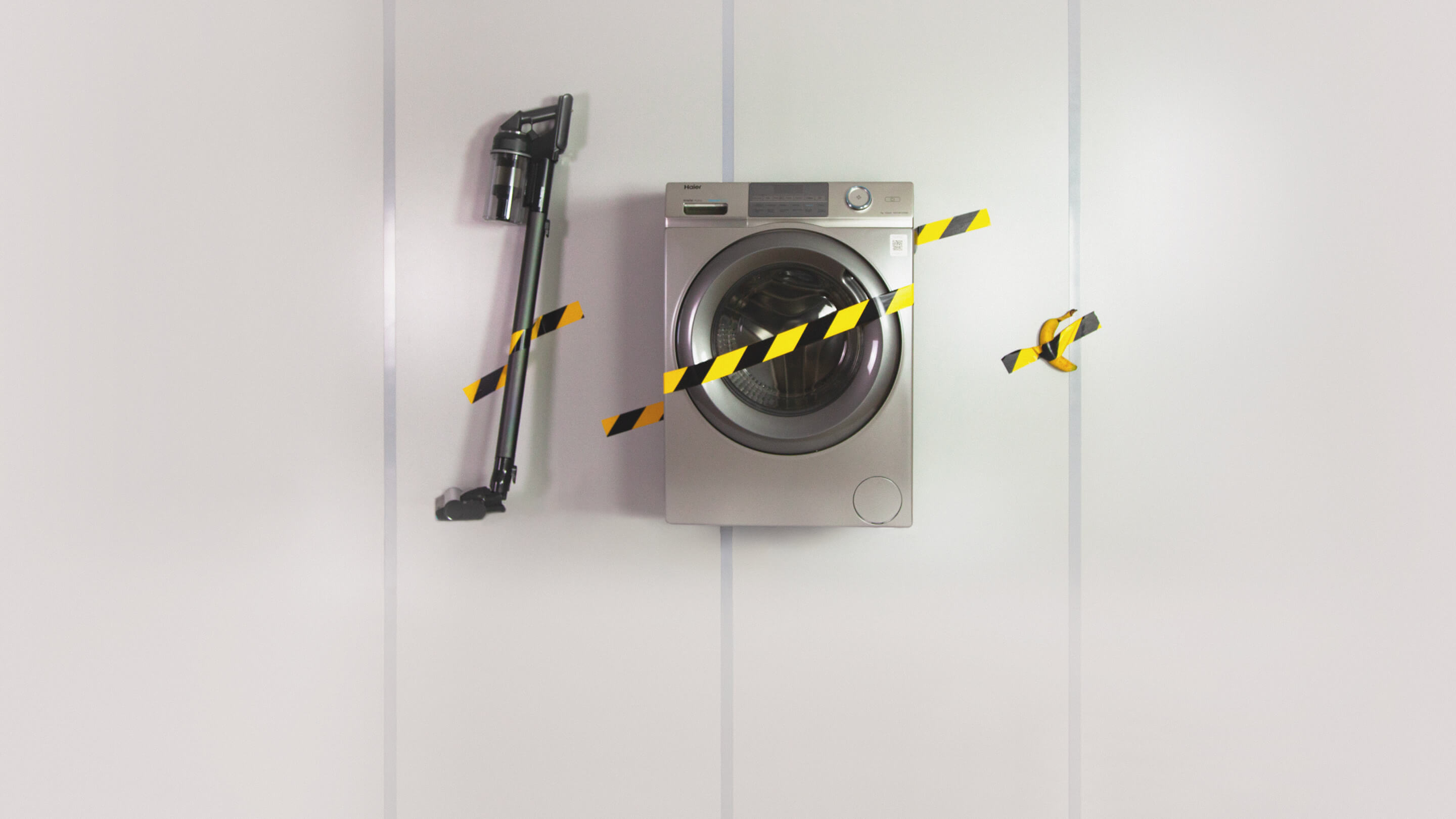 Фоновое изображение: стиральная машина, робот-пылесос и банан на стене Фоновое изображение: стиральная машина, робот-пылесос и банан на стене